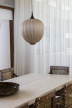 Dippa Pendant Light by Aqua Creations. Featured in this Brazilian weekend home designed by Carolina Maluhy. Photo by: Ruy Texeira.